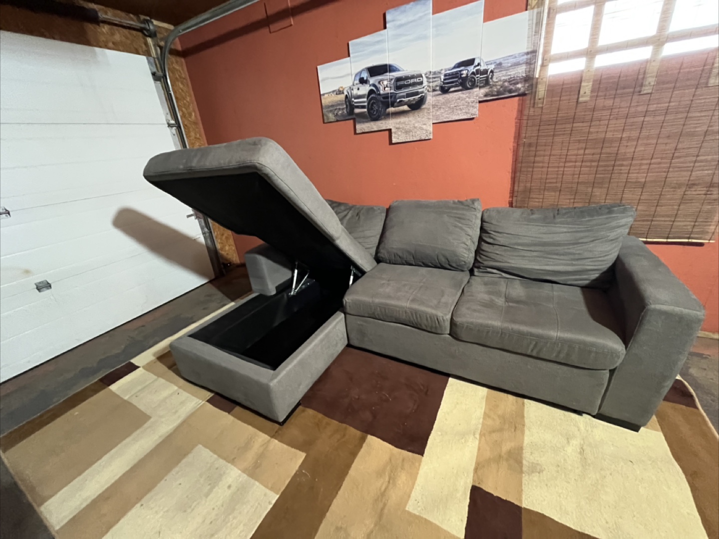 Light grey pull out bed sectional