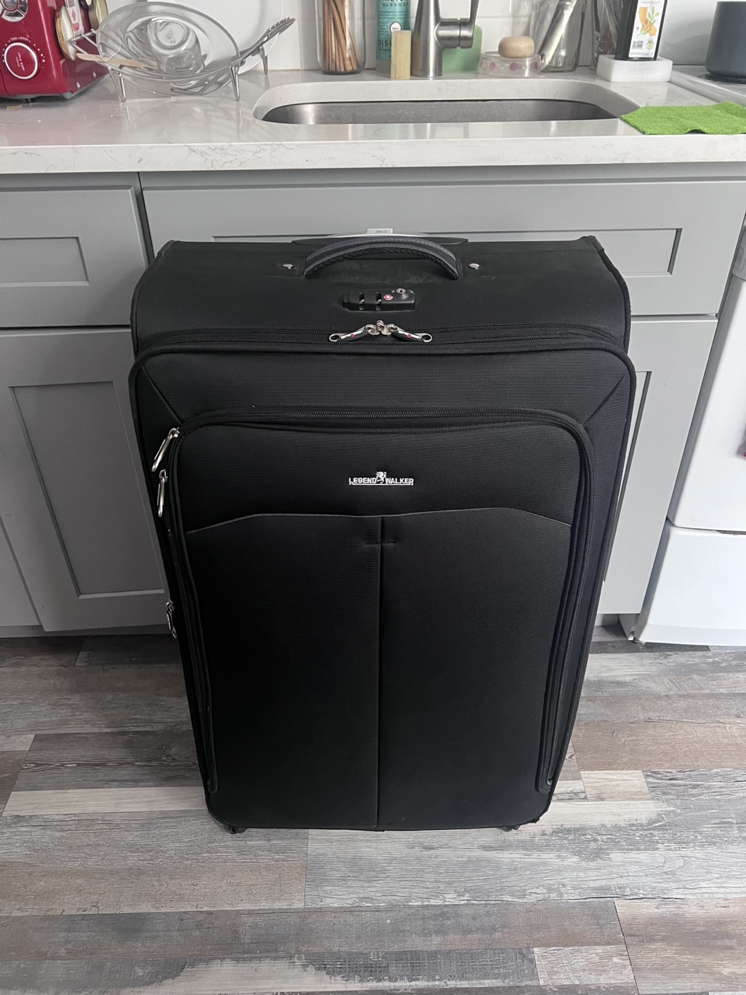 Legend Walker Black Rolling Suitcase