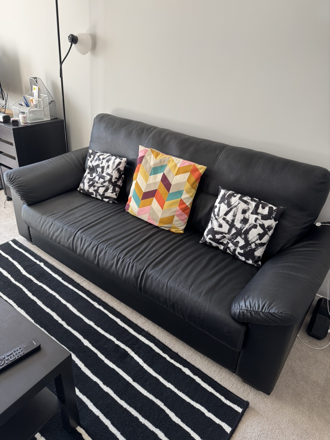Black Ikea sofa.