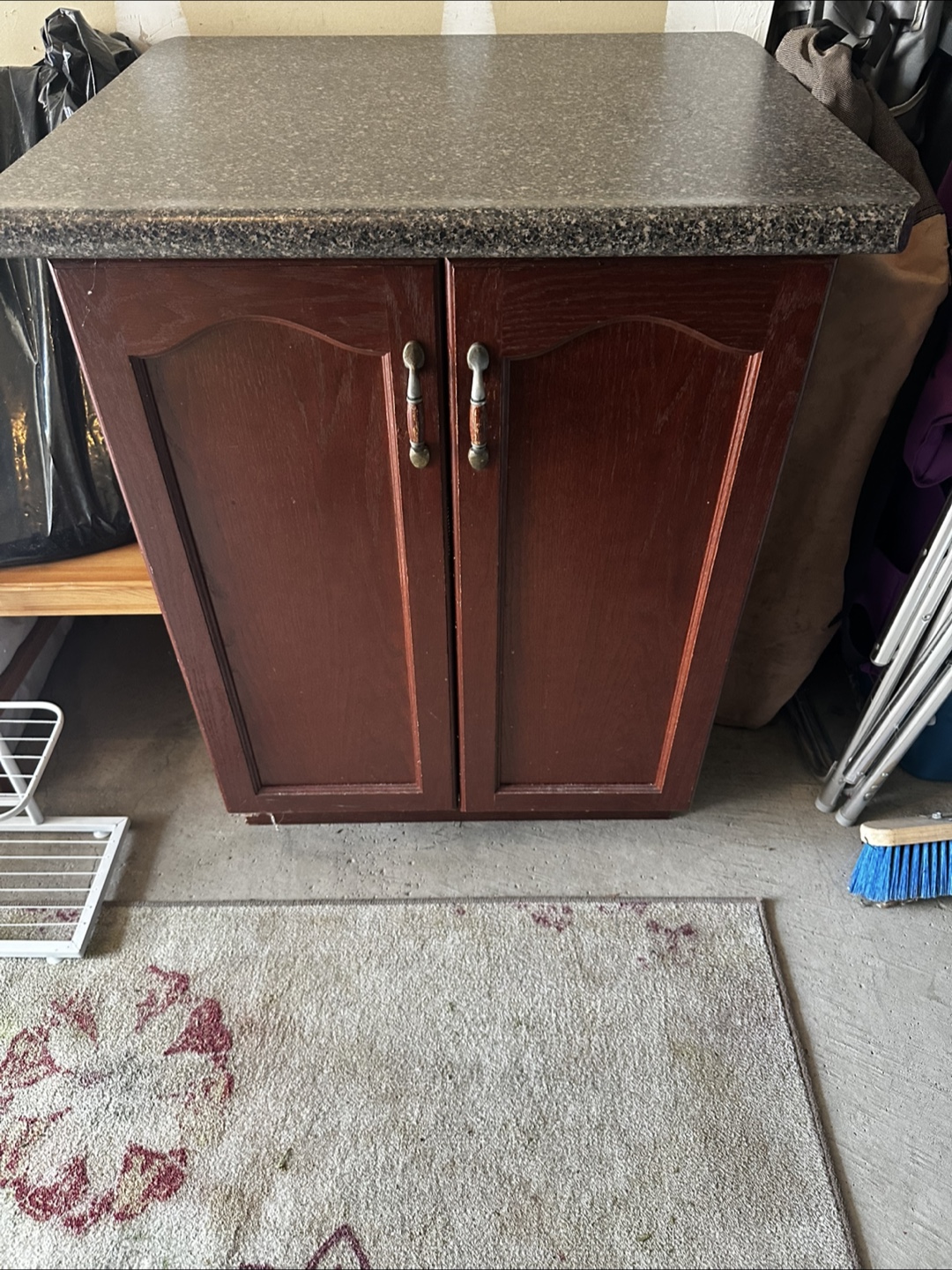 Brown Cabinet with imitation Granite Top