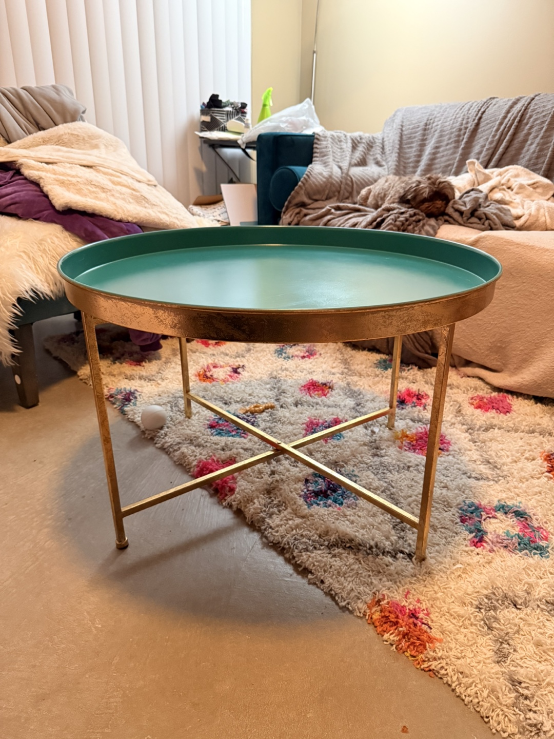 Round gold and teal coffee table