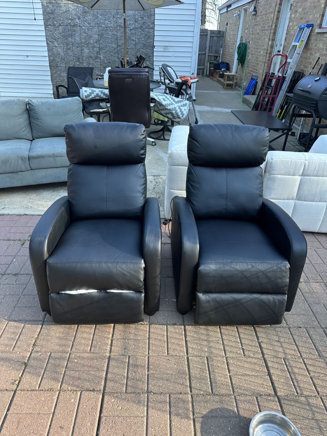 Pair of Black Leather Recliners - 32 inches - photo 2