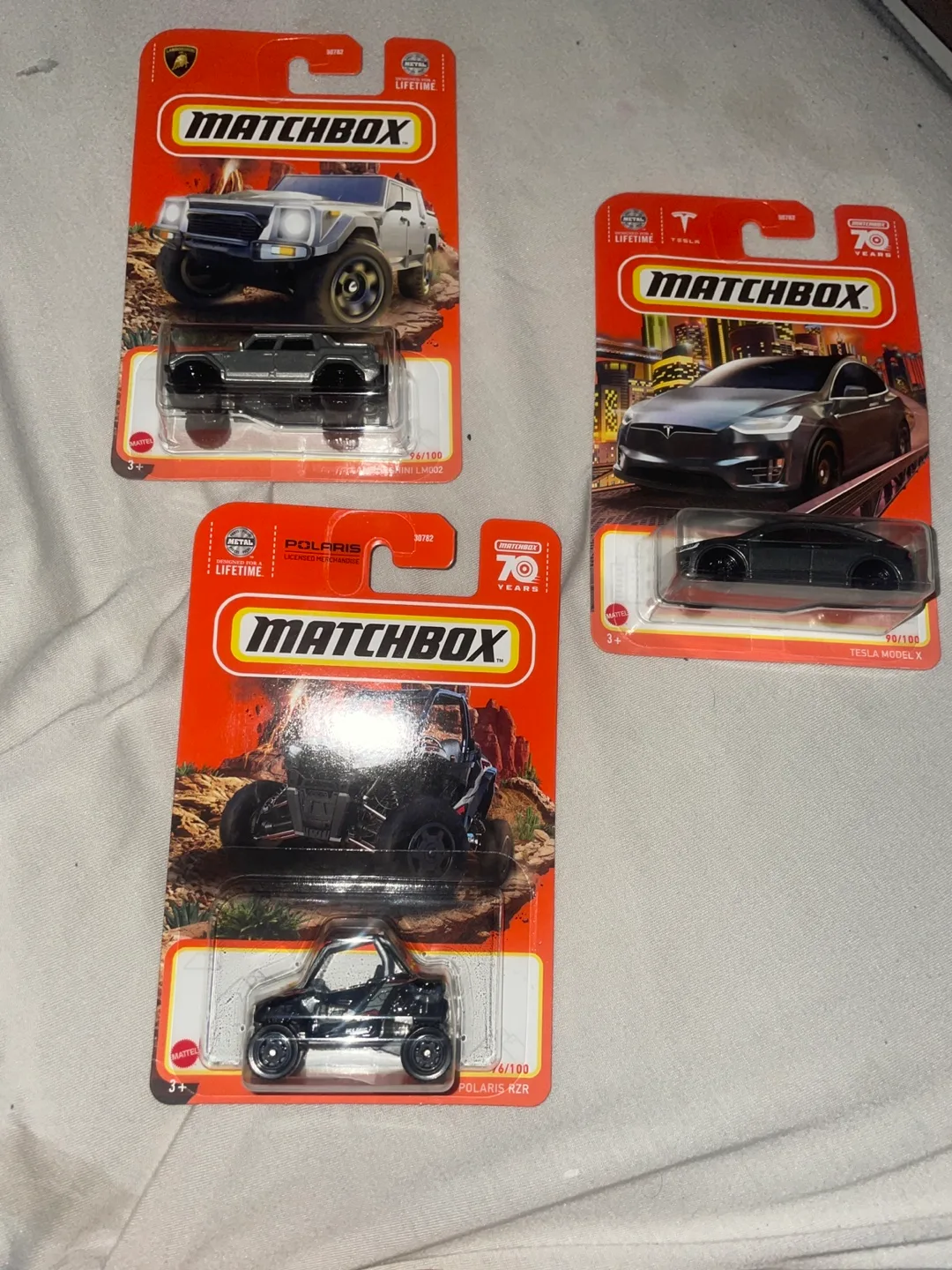 Matchbox Tesla Model X, Lamborghini LM002, & Polaris RZR image indicator(2)
