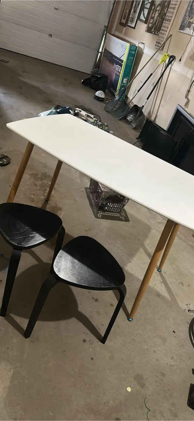 White Table with 2 Black Chairs thumbnail