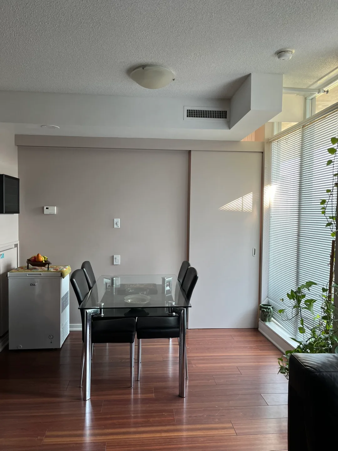 Glass Top Dining Table with 4 Black Chairs thumbnail