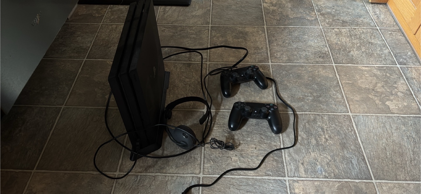PlayStation 4 Pro Console with Games and Accessories