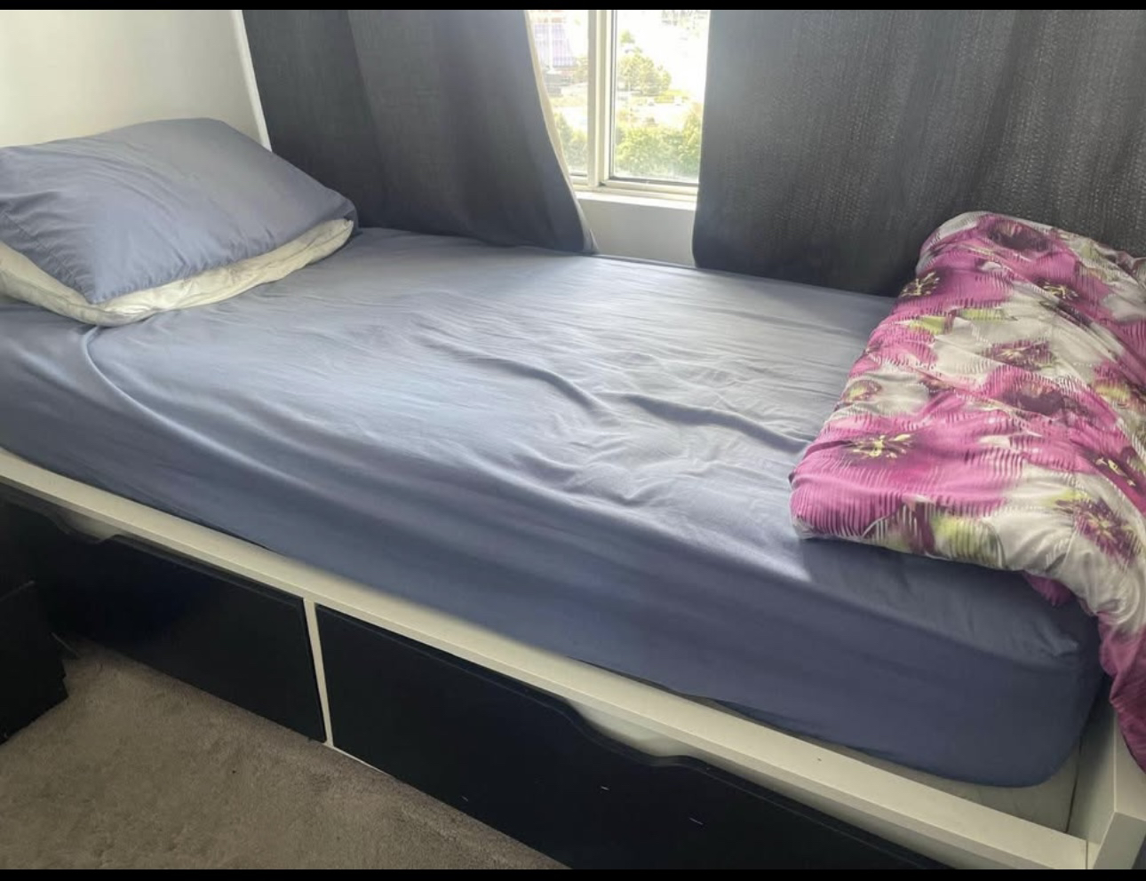 IKEA storage bed with side table