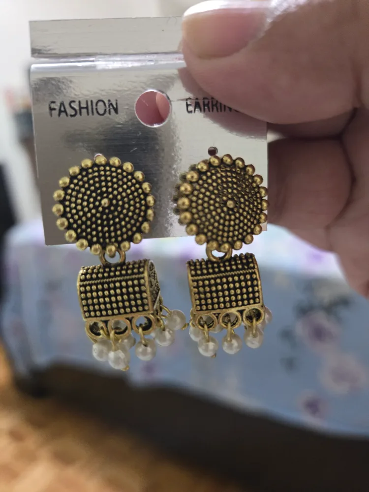 Gold coloured earrings thumbnail