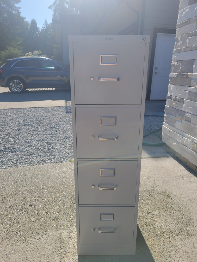 Used Grey 4-Drawer Filing Cabinet