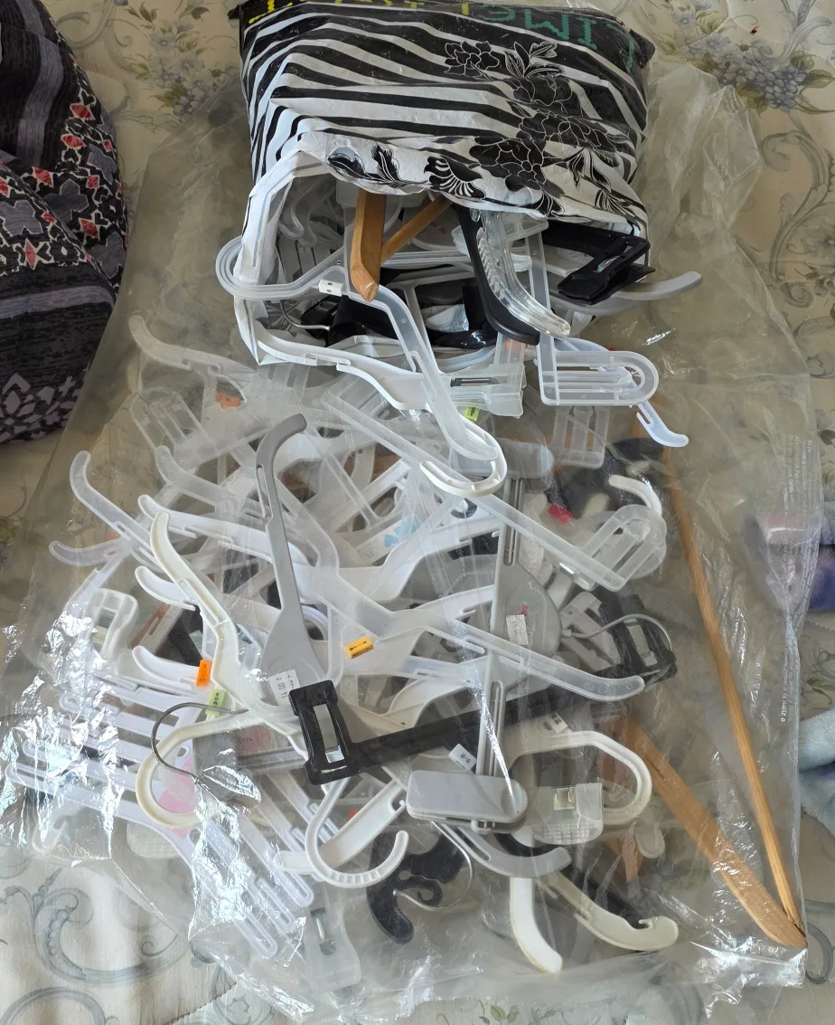 Lot of Clothing Hangers thumbnail