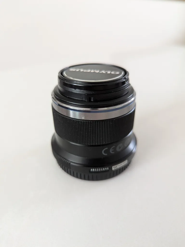 Olympus 45mm f/1.8 lens + UV filters thumbnail