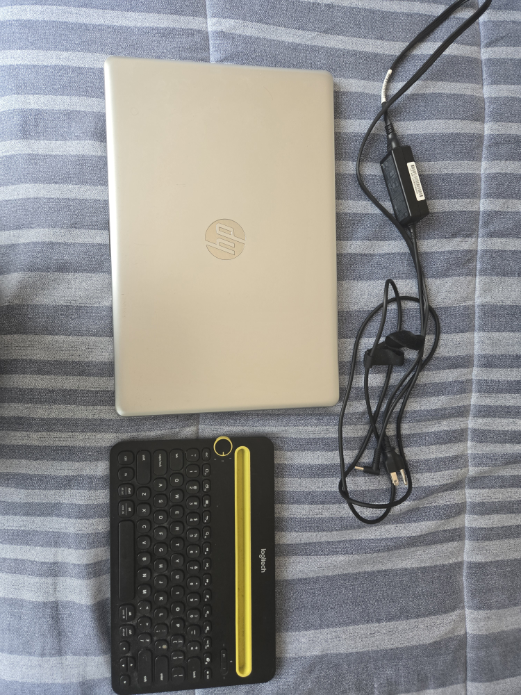 HP Laptop with Logitech Keyboard