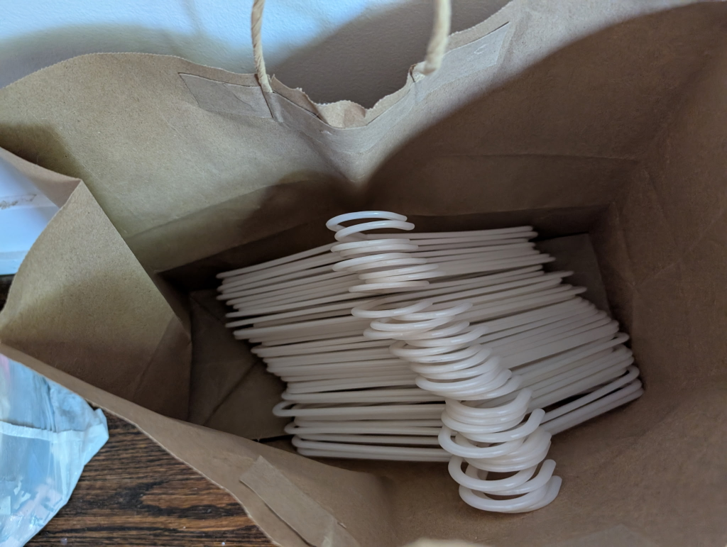 Baby/Toddler white plastic hangers