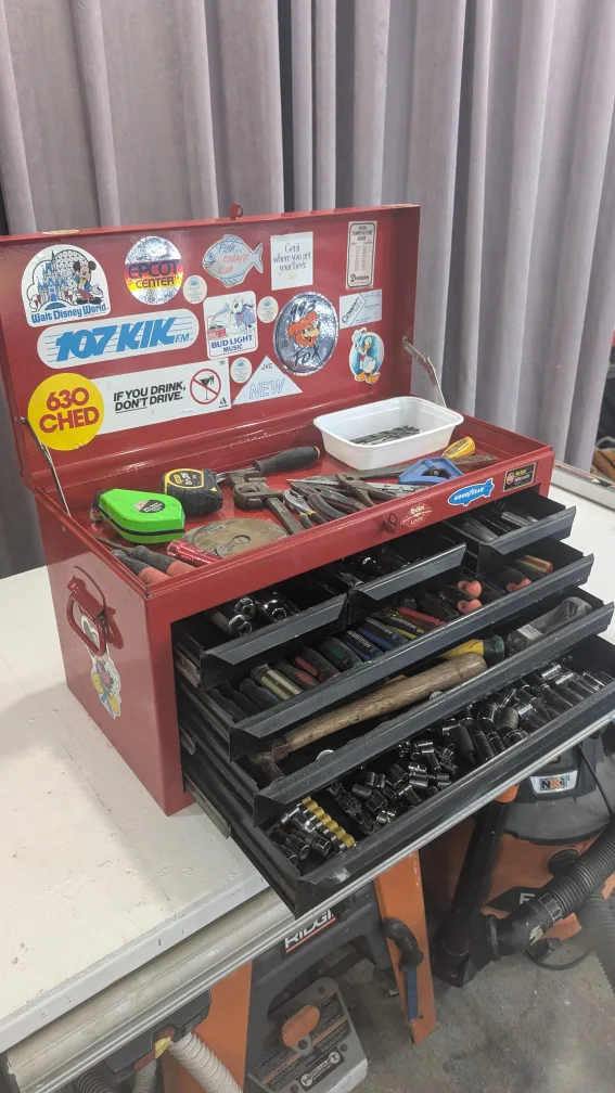 Red Metal Tool Chest filled with Tools and sockets thumbnail