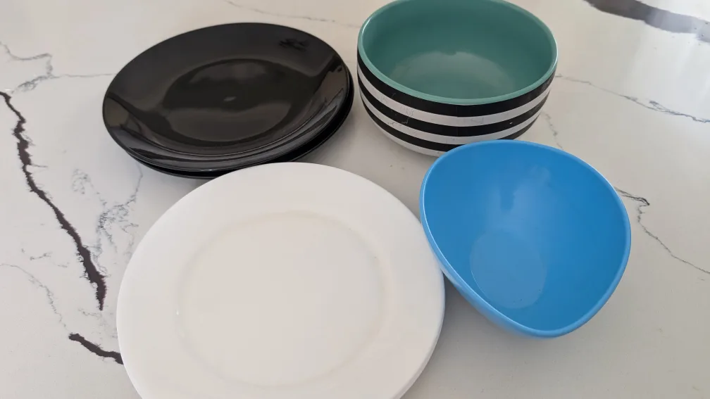 Set of assorted plates and bowls image indicator(2)