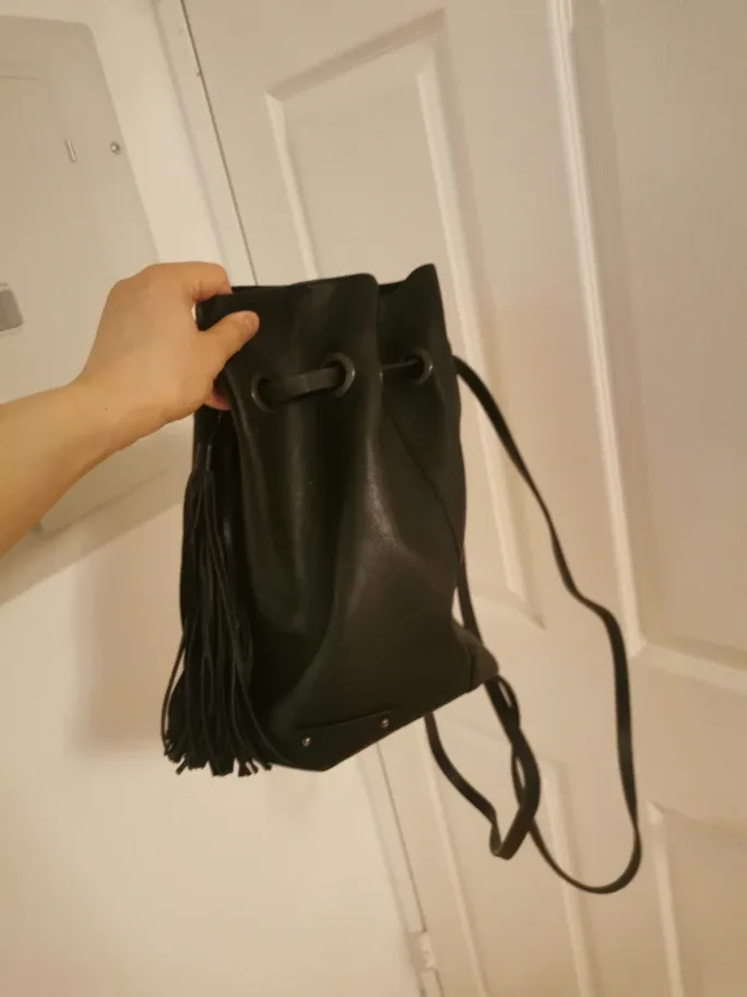Black Leather Tassel Drawstring Backpack image indicator(2)