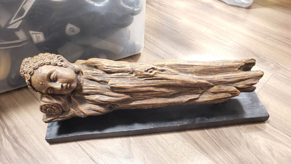 Buddha Statue on a Wood Base