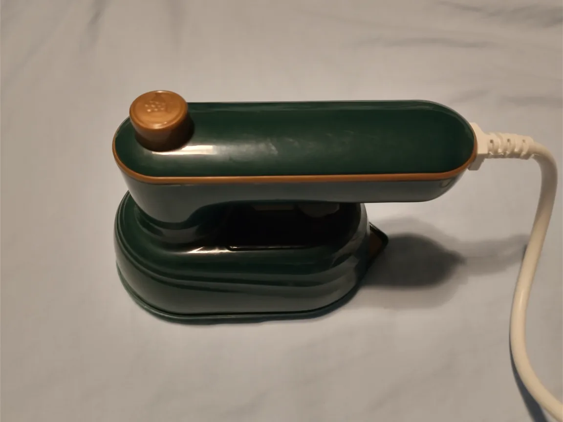 Dark green and bronze mini travel iron thumbnail
