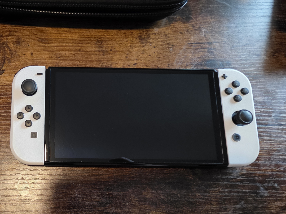 Nintendo Switch OLED Bundle - photo 2
