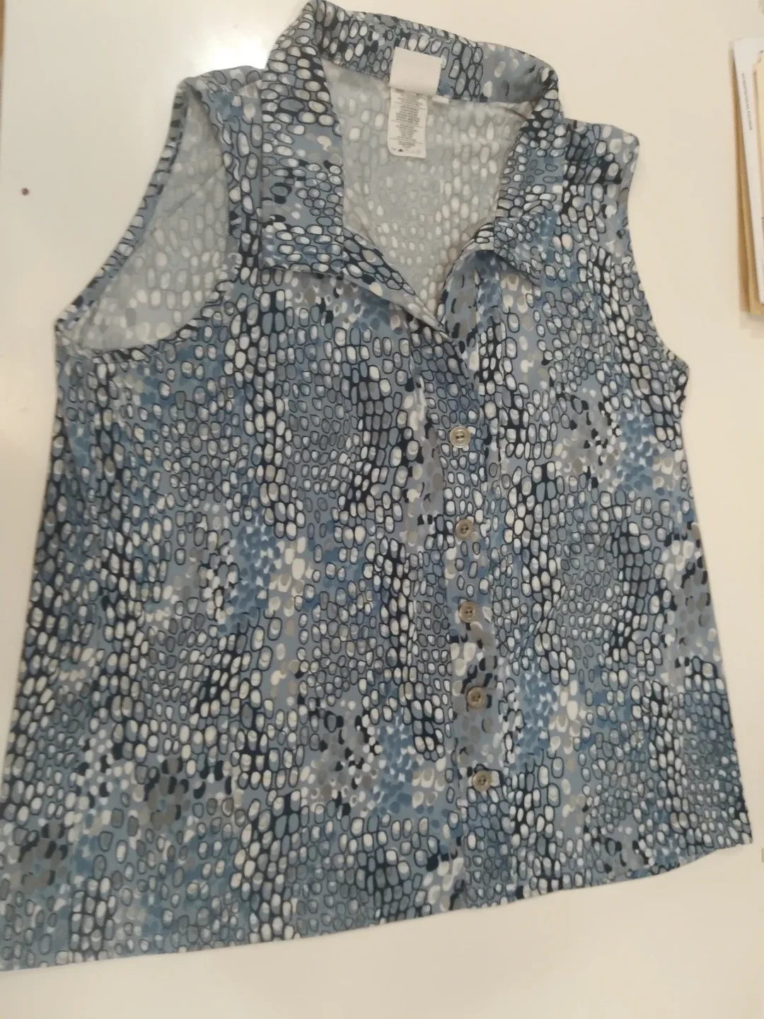 Sleeveless button-up top and white leggings thumbnail
