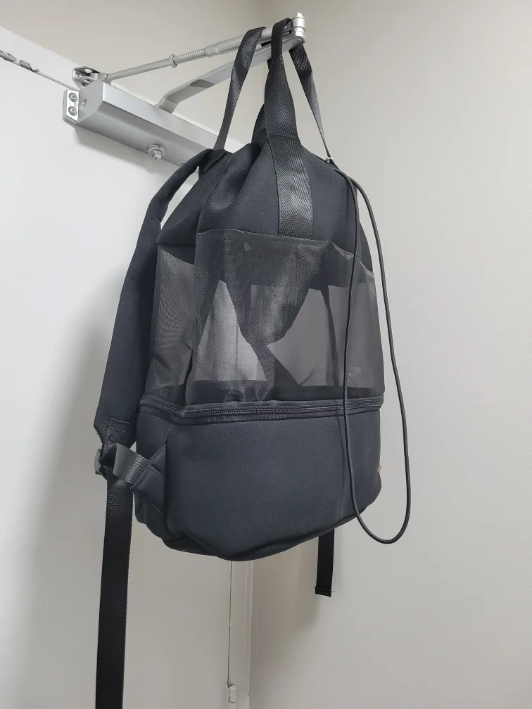 Black Backpack with Mesh Detailing image indicator(3)