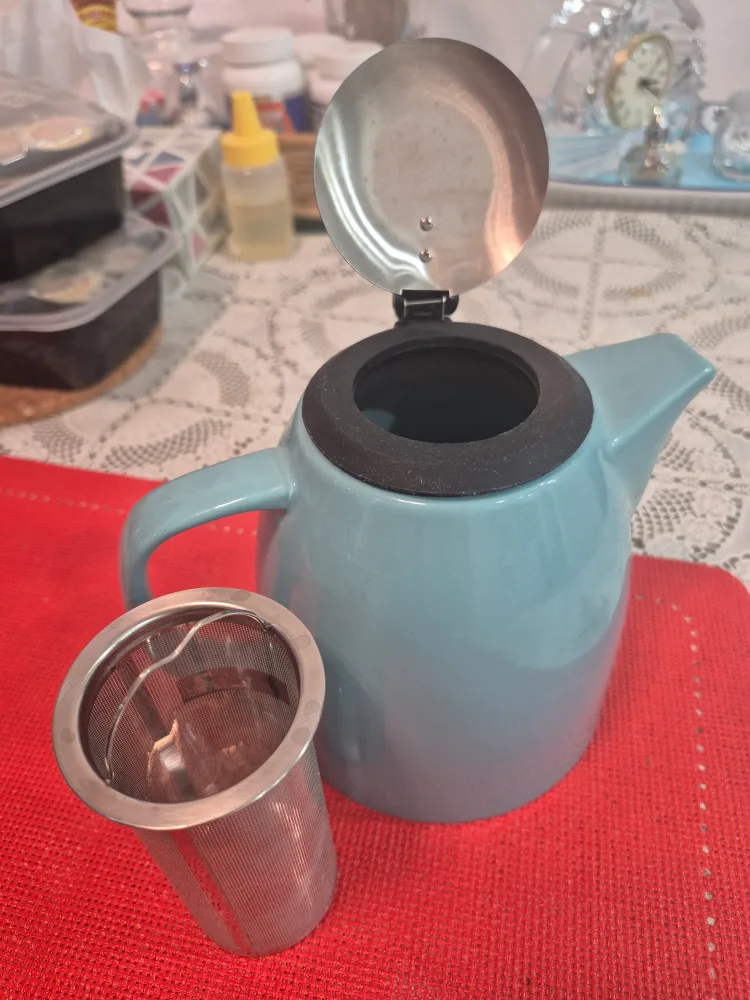 Teapot with stainless steel lid and infuser image indicator(5)