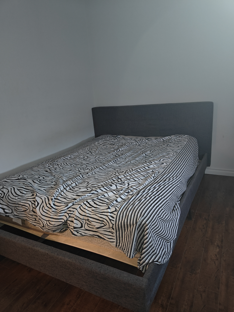 Grey upholstered bed frame
