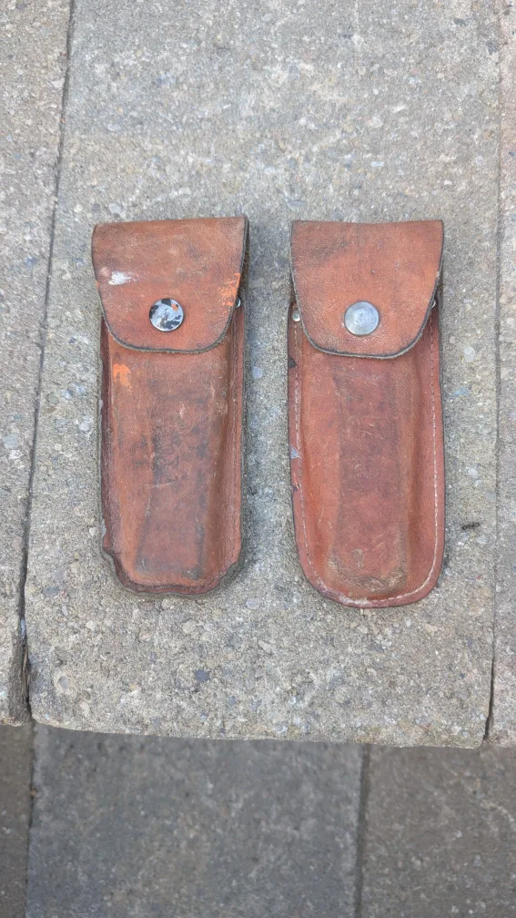 Vintage pocket knives with leather sheaths image indicator(3)