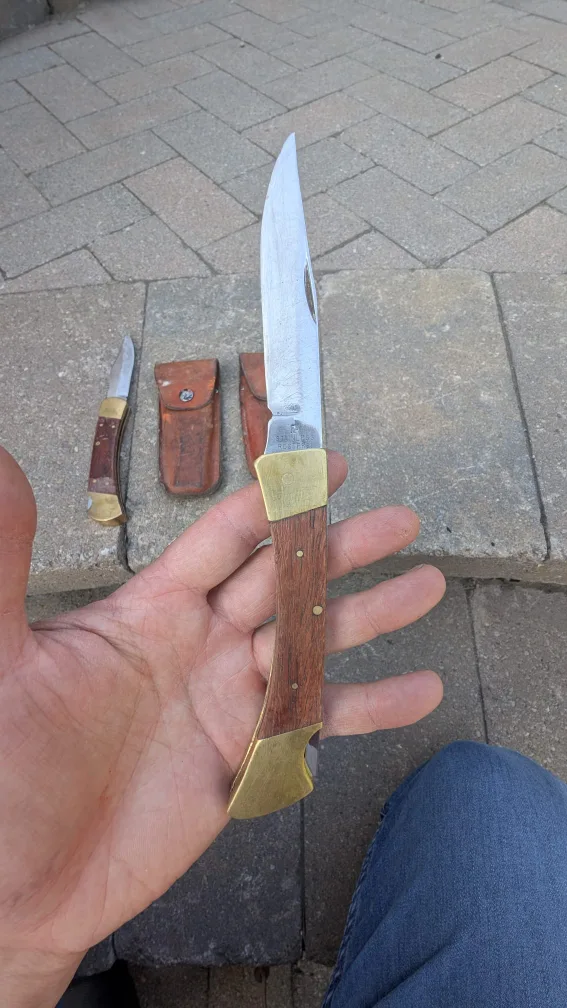 Vintage pocket knives with leather sheaths image indicator(5)