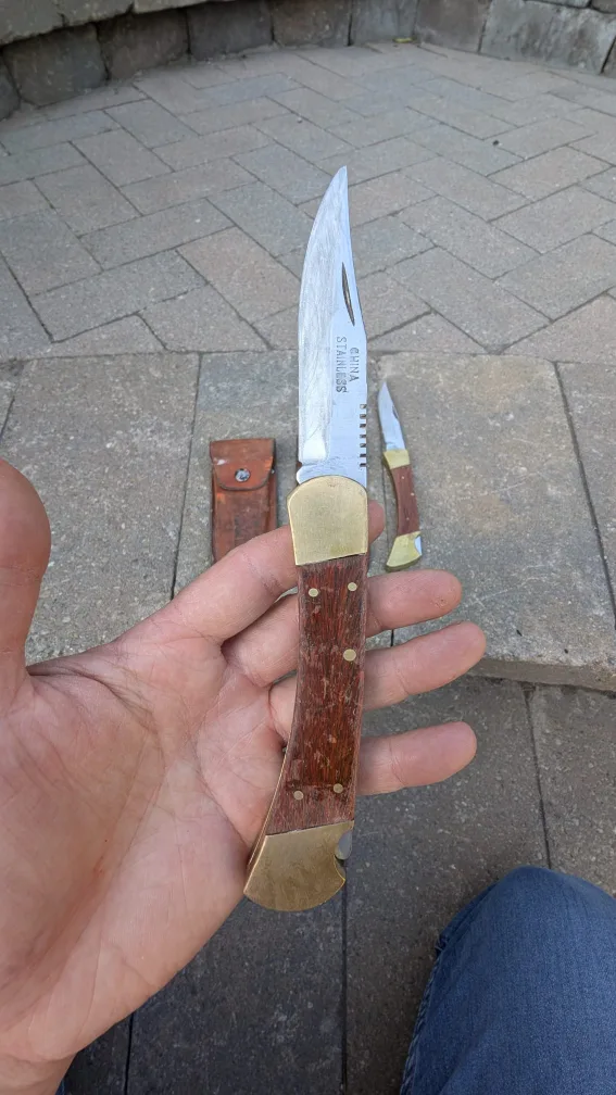 Vintage pocket knives with leather sheaths image indicator(6)