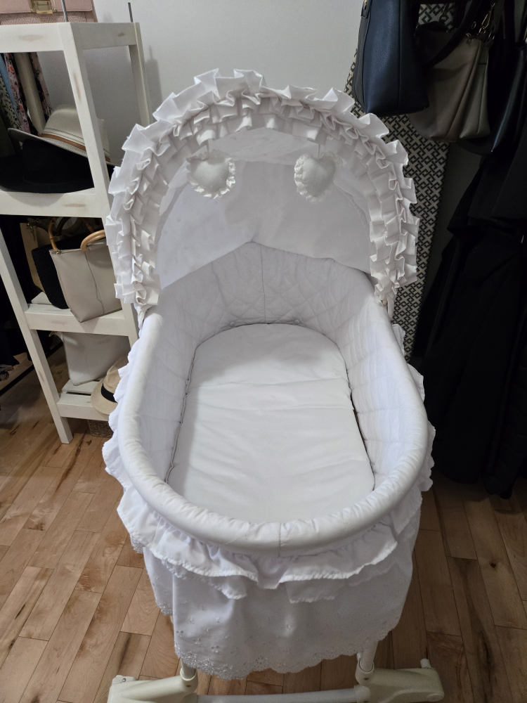 White bassinet with canopy