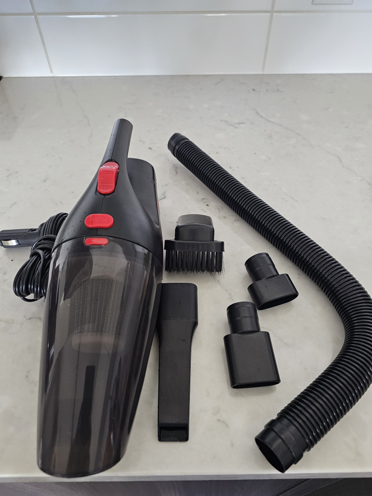 Compact handheld vacuum cleaner with attachments