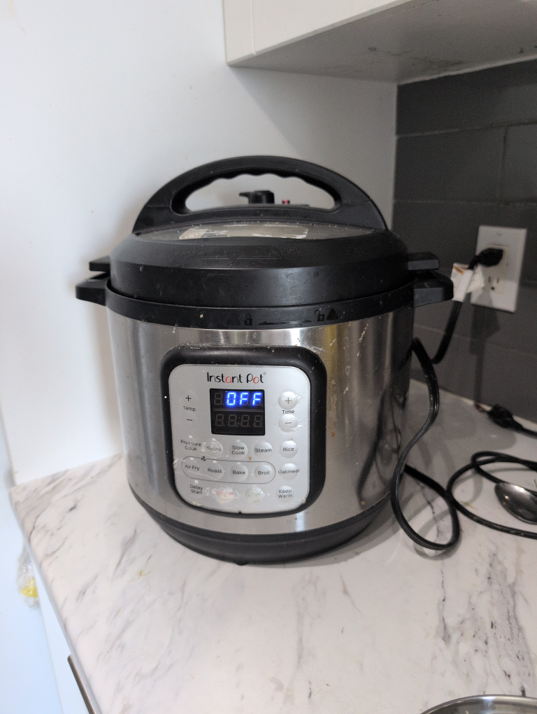 Instant Pot Electric Pressure Cooker with air fryer
