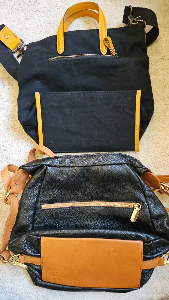 Black leather bag with tote and dust bag image indicator(2)