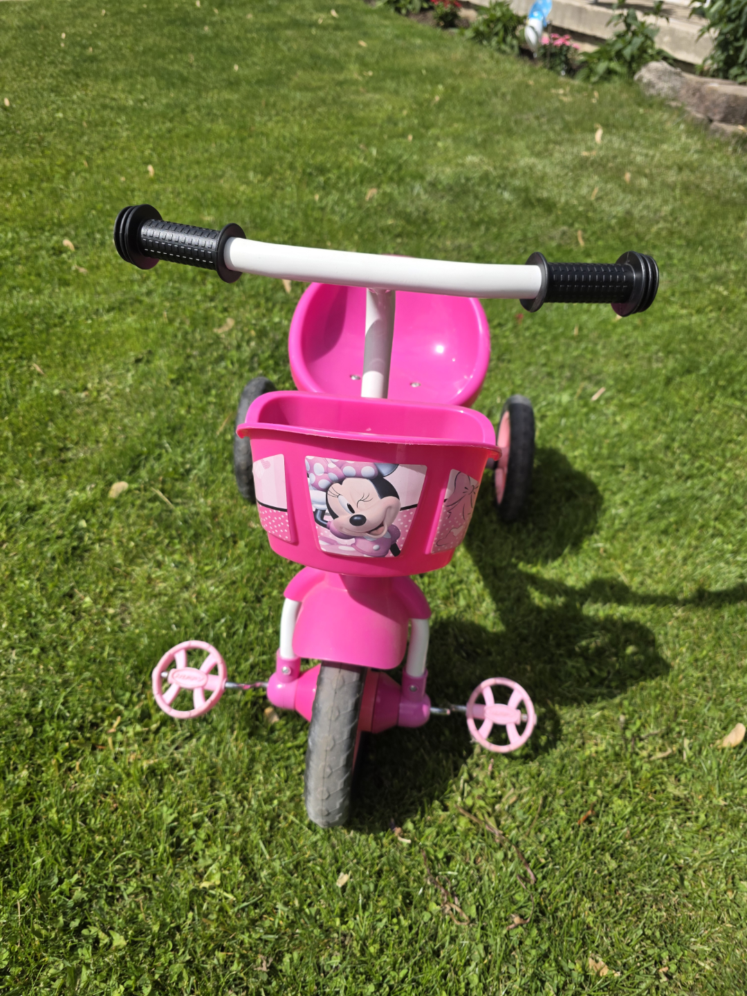 Pink children's tricycle