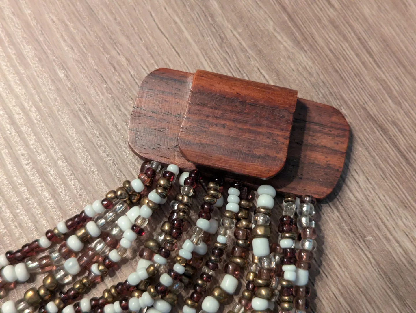 Beaded necklace with wood clasp image indicator(3)