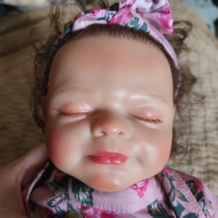 realistic baby doll