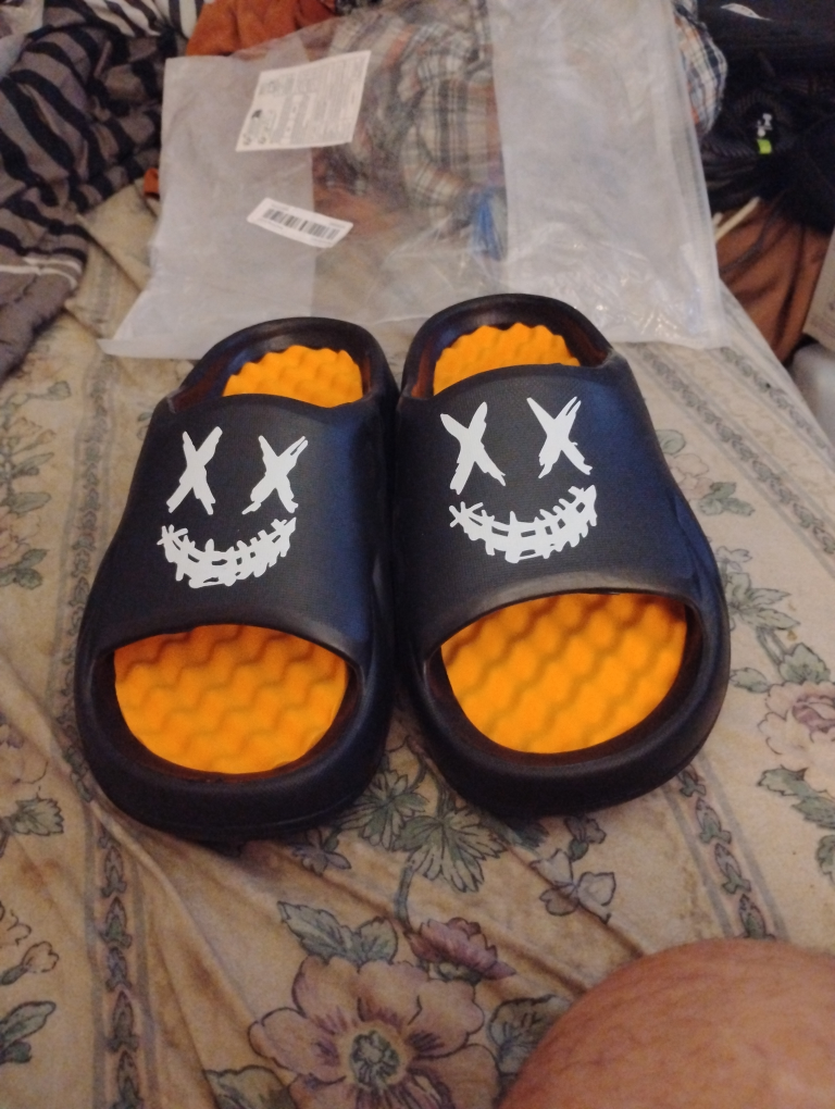 Black & Orange Slides with Face Design
