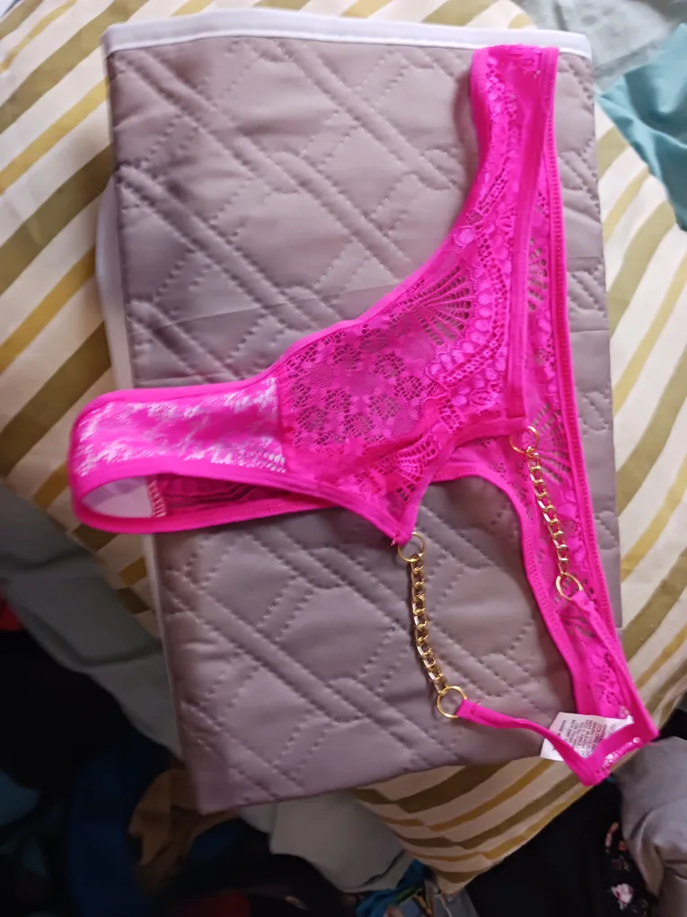Pink lingerie set with gold chain detailing image indicator(2)