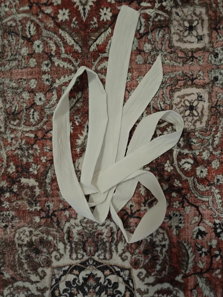 Elegant dusty rose abaya with white trim image indicator(5)