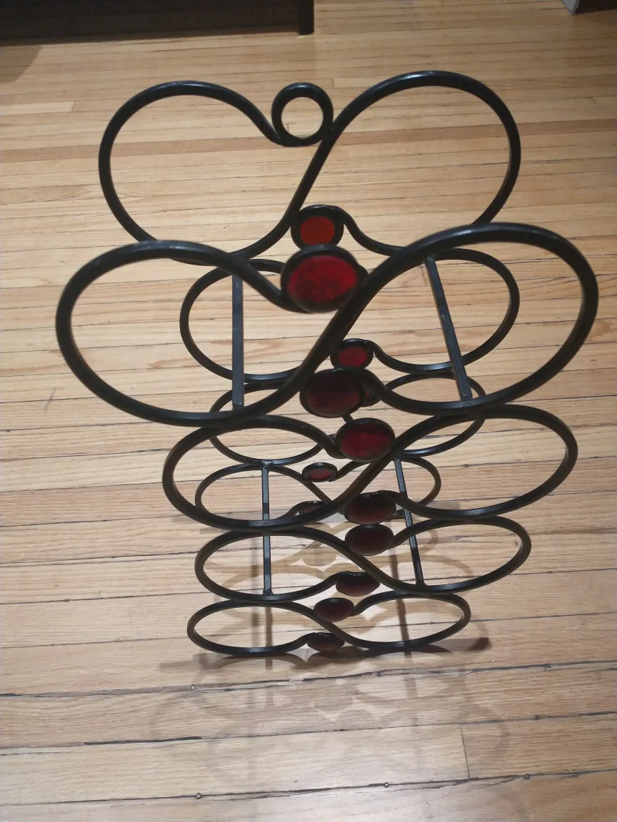 Unique black metal wine bottle rack image indicator(3)