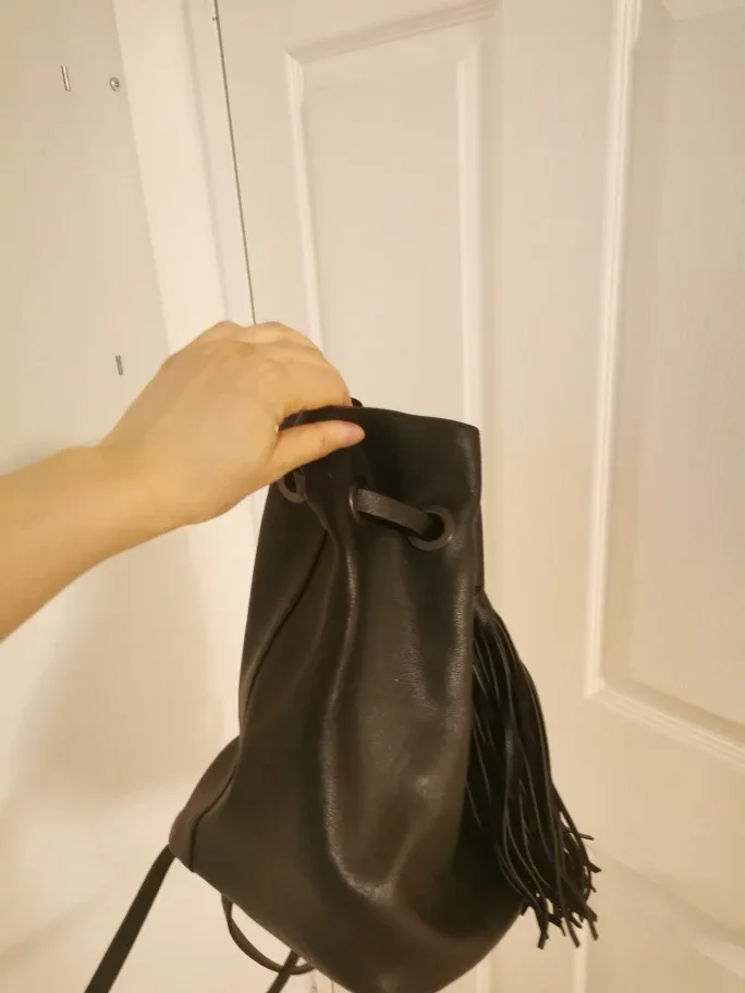 Black Leather Tassel Drawstring Backpack image indicator(8)