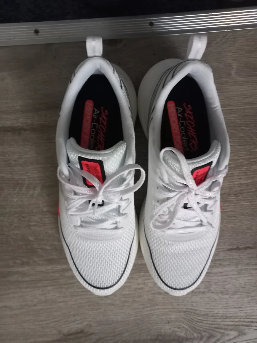 White sketchers shoes with box image indicator(2)