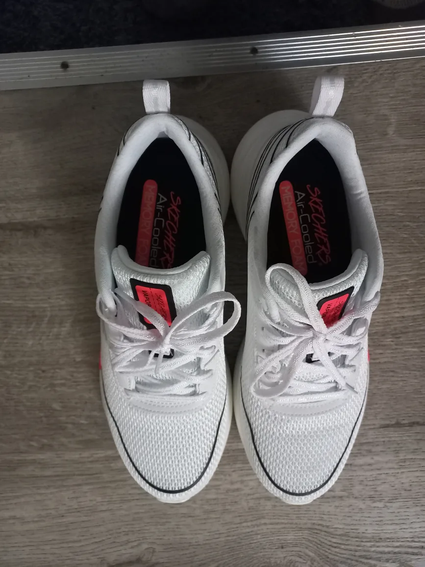 White sketchers shoes with box image indicator(3)