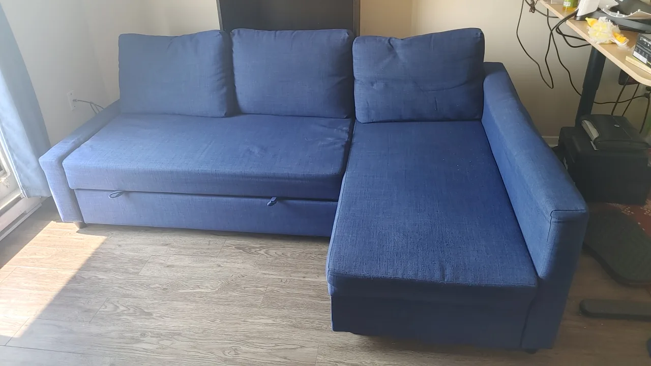 Dark Blue IKEA FRIHETEN sofa bed with storage