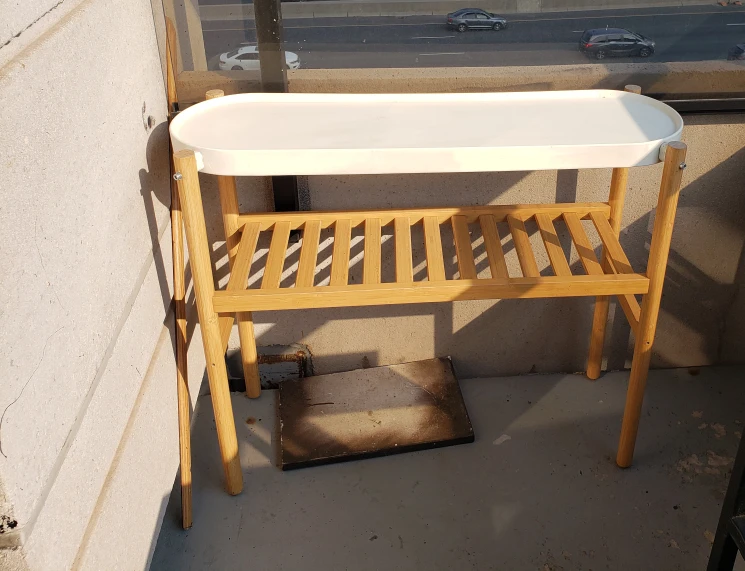 Wooden Side Table with Shelves . To put a flower pot