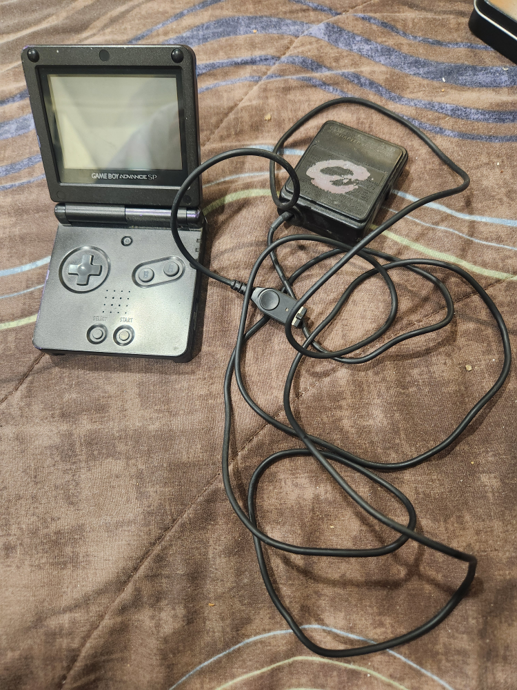 Game Boy Advance SP Console + 4 Games