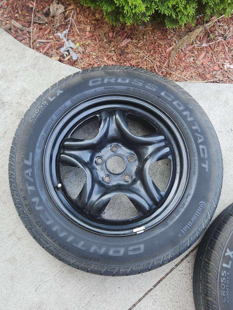 Set of four used rims and tires - photo 2