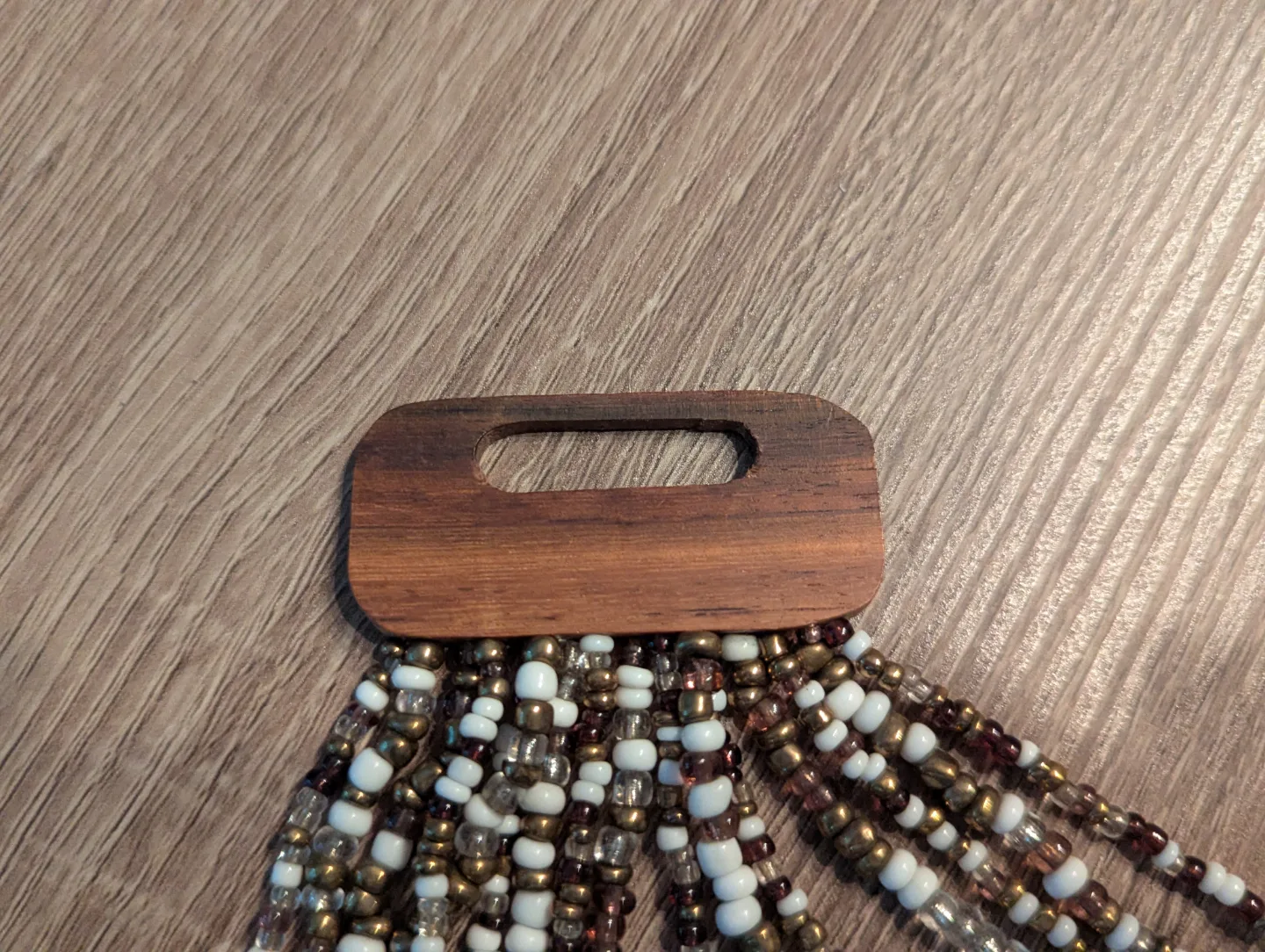 Beaded necklace with wood clasp image indicator(4)