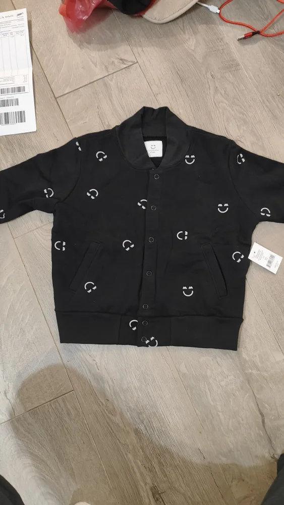 Black Bomber Jacket with Smiley Face Design image indicator(2)